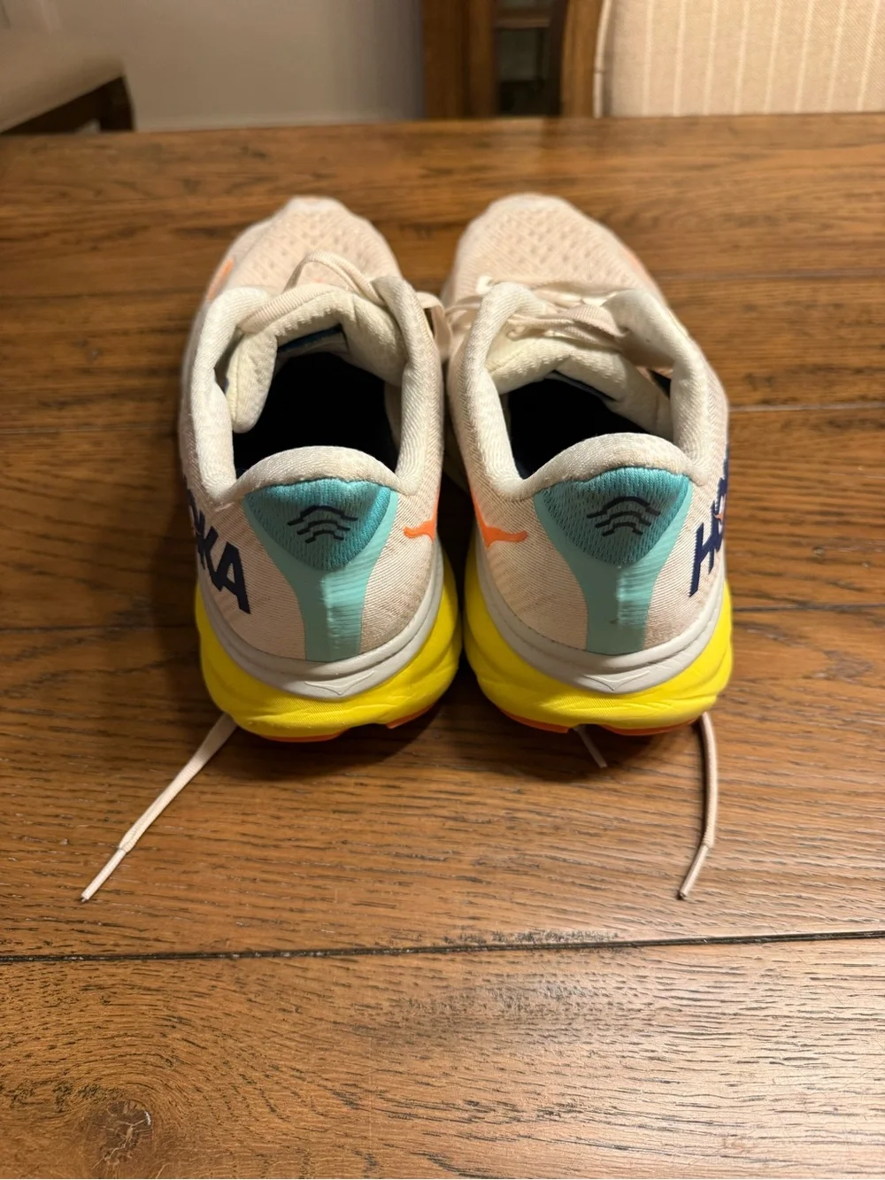 Hoka Men's Running Sneakers in Cream with Orange and Yellow Accents